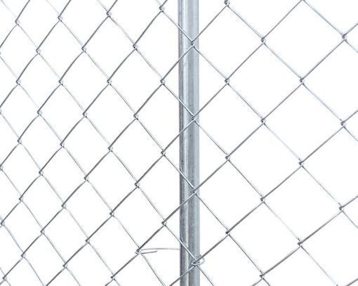 Block wall and net fence stock image. Image of link, background